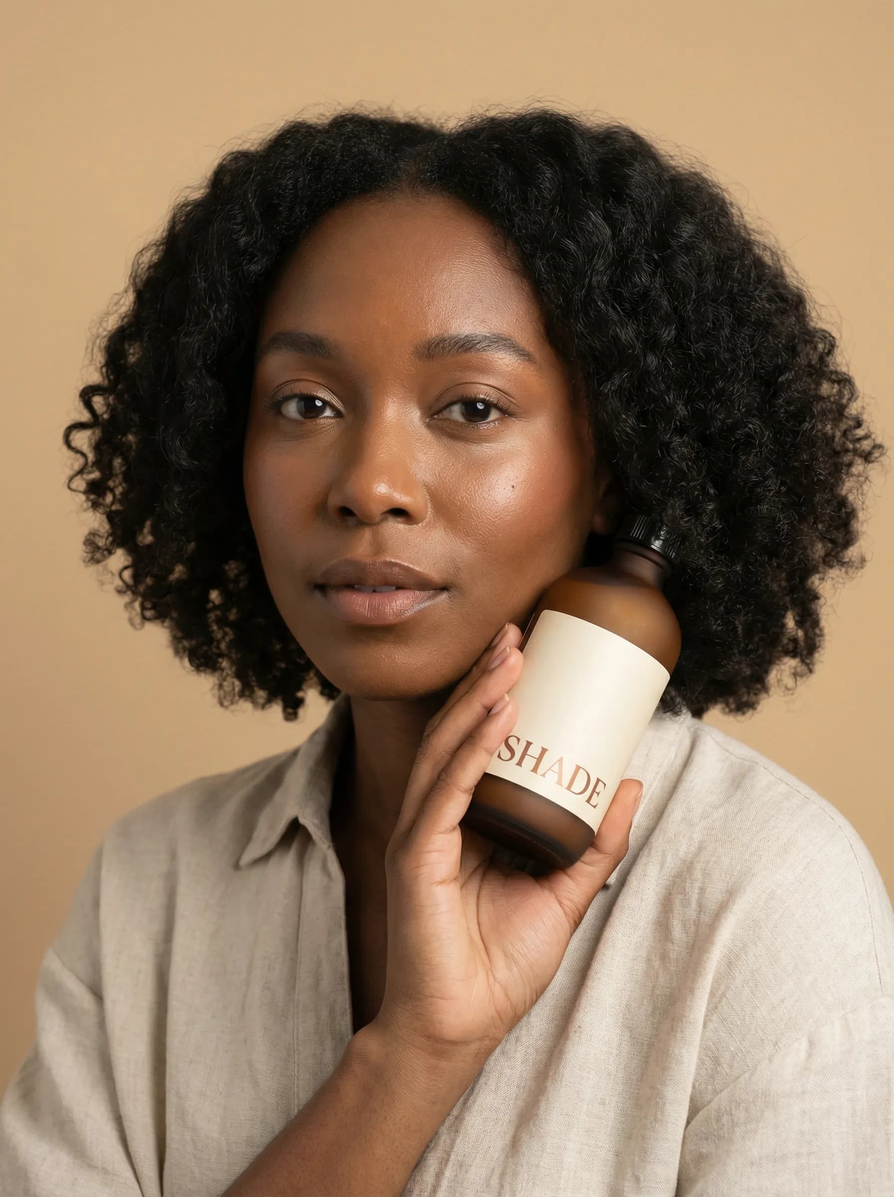 Shade Wellness routine shelf with warm product styling